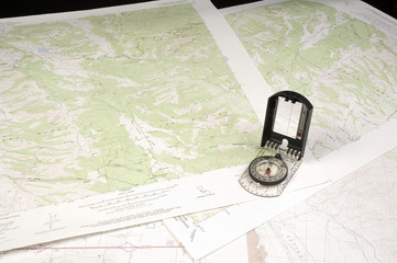 several topo Maps and compass
