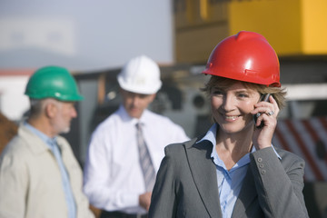 Engineer talking on cellphone on location