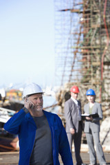 Oil rig survey engineer talking on cellphone