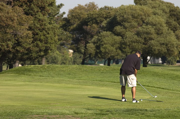 Golfer on green