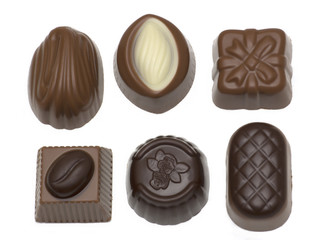 Assortment of milk and dark chocolates isolated on white 