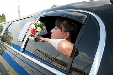 bride in the limousine - obrazy, fototapety, plakaty