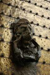 Ancient door handle with the Lion head, Cordoba, Spain