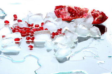 ripe and fresh Pomegranate with ice