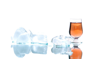 gold alcohol drink with ice