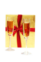Giftbox and champagne isolated on the white