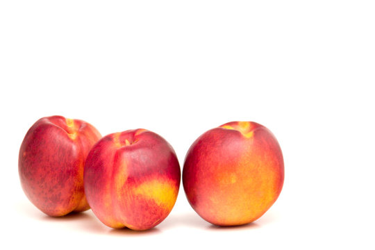 Peaches isolated on white 