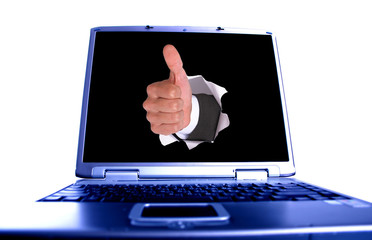 businessman hand OK in the hole on laptop