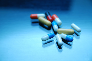 pills on glosy surface 