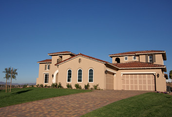 Abstract of newly constructed, modern home facade.