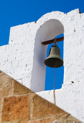Bell on the church. Lindos town. Rhodes island. Greece