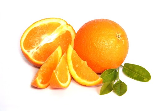 Juicy oranges whole and cut