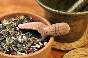 Mortar with bowl with herbs