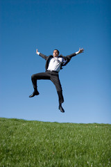 Businessman jumping