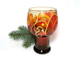 Candle and fir-tree branch