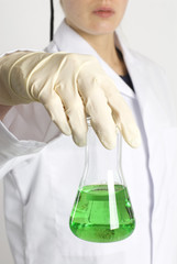female hand with erlenmeyer