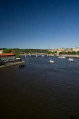Fototapeta na wymiar Prague river Vltava, bridge and ships view from Charles