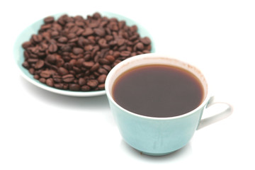 The cup with fragrant coffee costs on a table