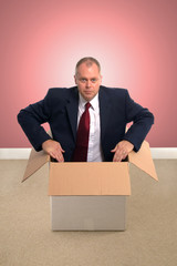 Businessman in a box.