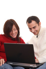 Fototapeta na wymiar happy couple with laptop