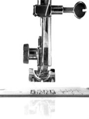 B&W close-up photo of a sewing machine