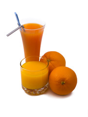fresh made breakfast juice and two oranges