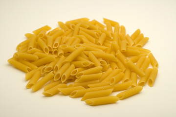  big penne pasta on white background
