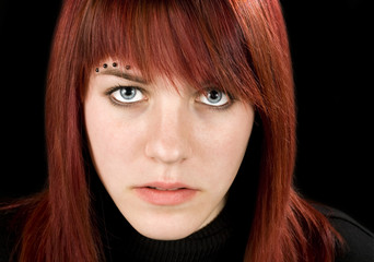 Naklejka premium Beautiful girl staring at camera
