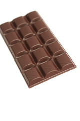 Tile of tasty chocolate on a white background