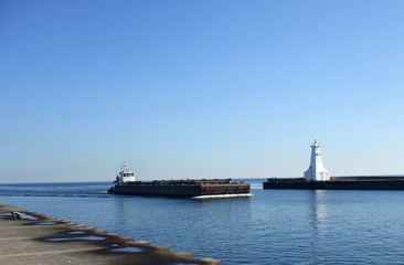 Barge Enters Harbor
