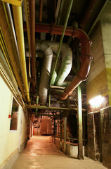 An assortment of different size and shaped pipes at a power plan