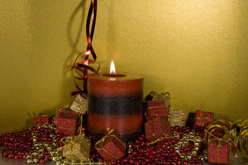 Christmas decorations with lit Candle