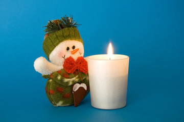 Snowman and candle