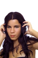 Girl and music - young girl with headphones isolated