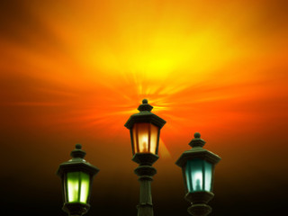 Fototapeta na wymiar Lamps on a red sky