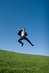 Fototapeta na wymiar Businessman jumping