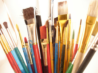 Obraz premium Paint Brushes in a Cup Close