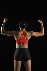 Fototapeta na wymiar Back of muscular woman.