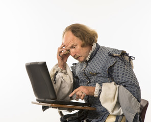 Shakespeare using laptop.