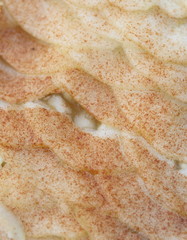 sliced apple with cinnamon