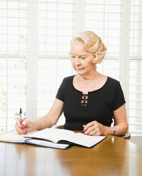 Mature Woman With Calendar.