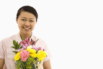 Woman holding flowers.