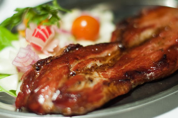Grill meat and salad. Shallow dof.