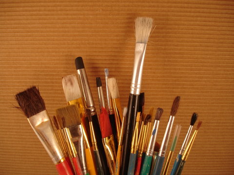 Paint Brushes Rustic Brown Background