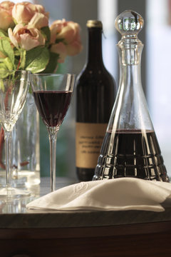 red wine iin crystal bottle and glasses