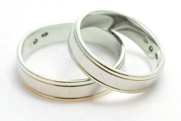 Wedding rings on white background