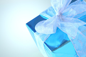 Elegant sky blue present with silver ribbons  