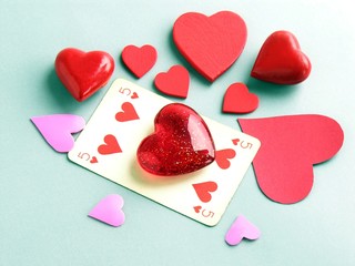 five red hearts on playing card