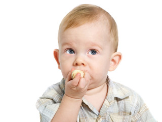 Boy eating banana
