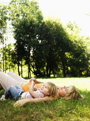 Mom and child in park.